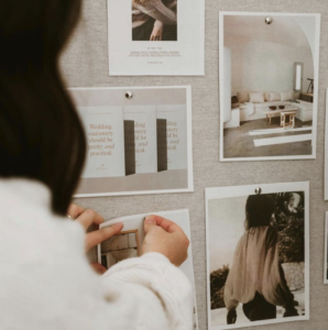 a mood board with different images being hung