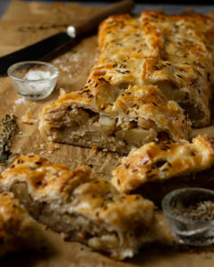 close up of cauliflowers and potato puff pastry on a board