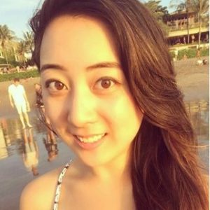 woman with brown hair smiling