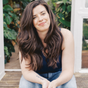 woman with brown hair smiling