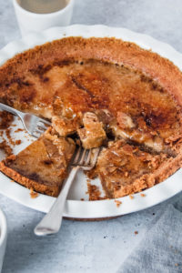 bowl of creme brulee with two forks