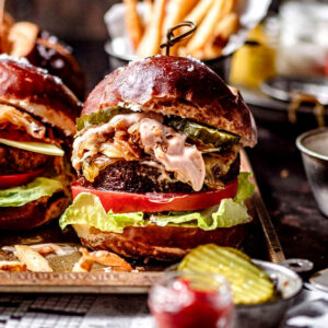 picture of a beyond burger with tomatoes, lettuce, and toppings