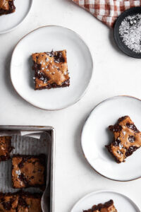 3 white plates with tahini maple bars on them