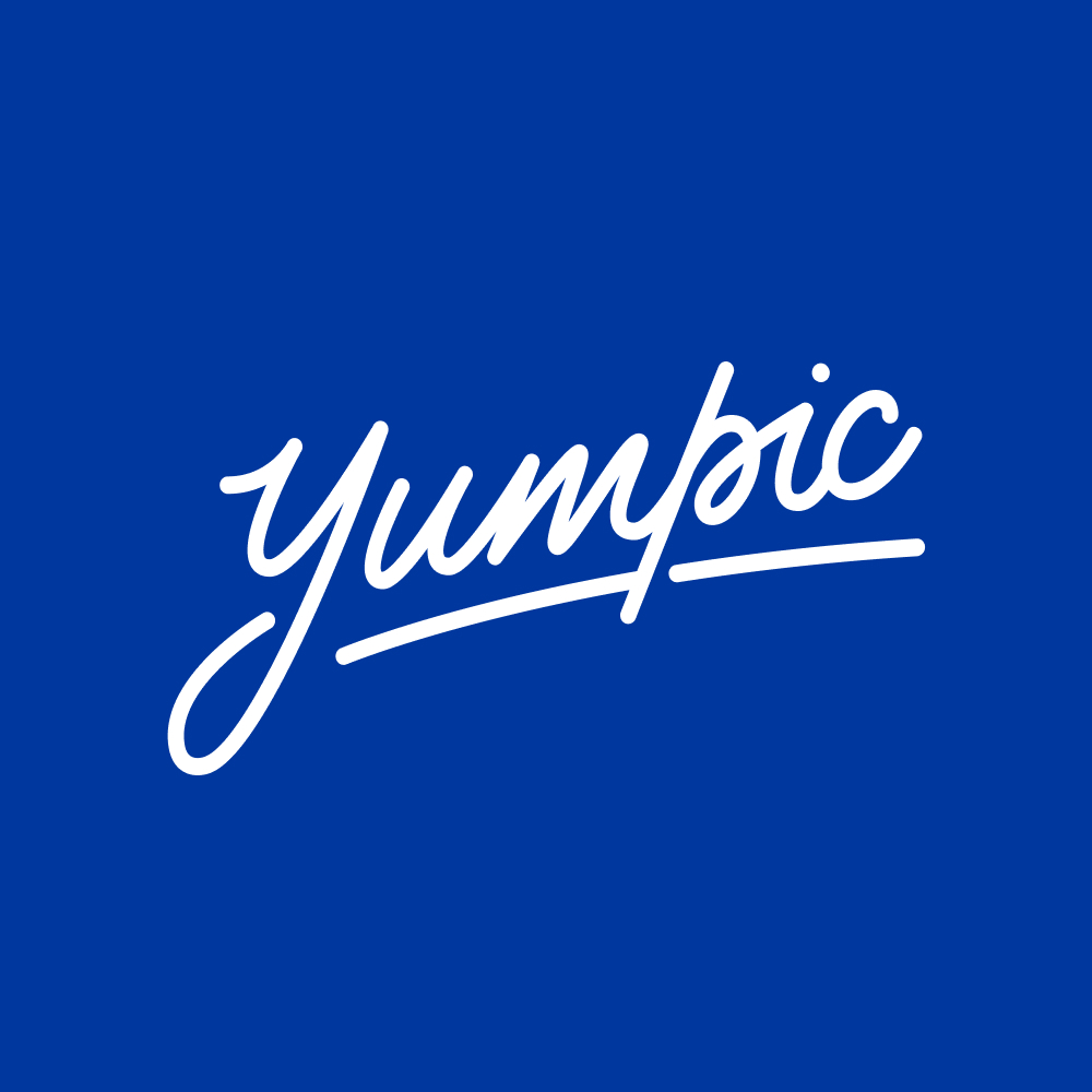 The Yumpic logo featuring the word 'Yumpic' written in elegant white script against a bold blue background.